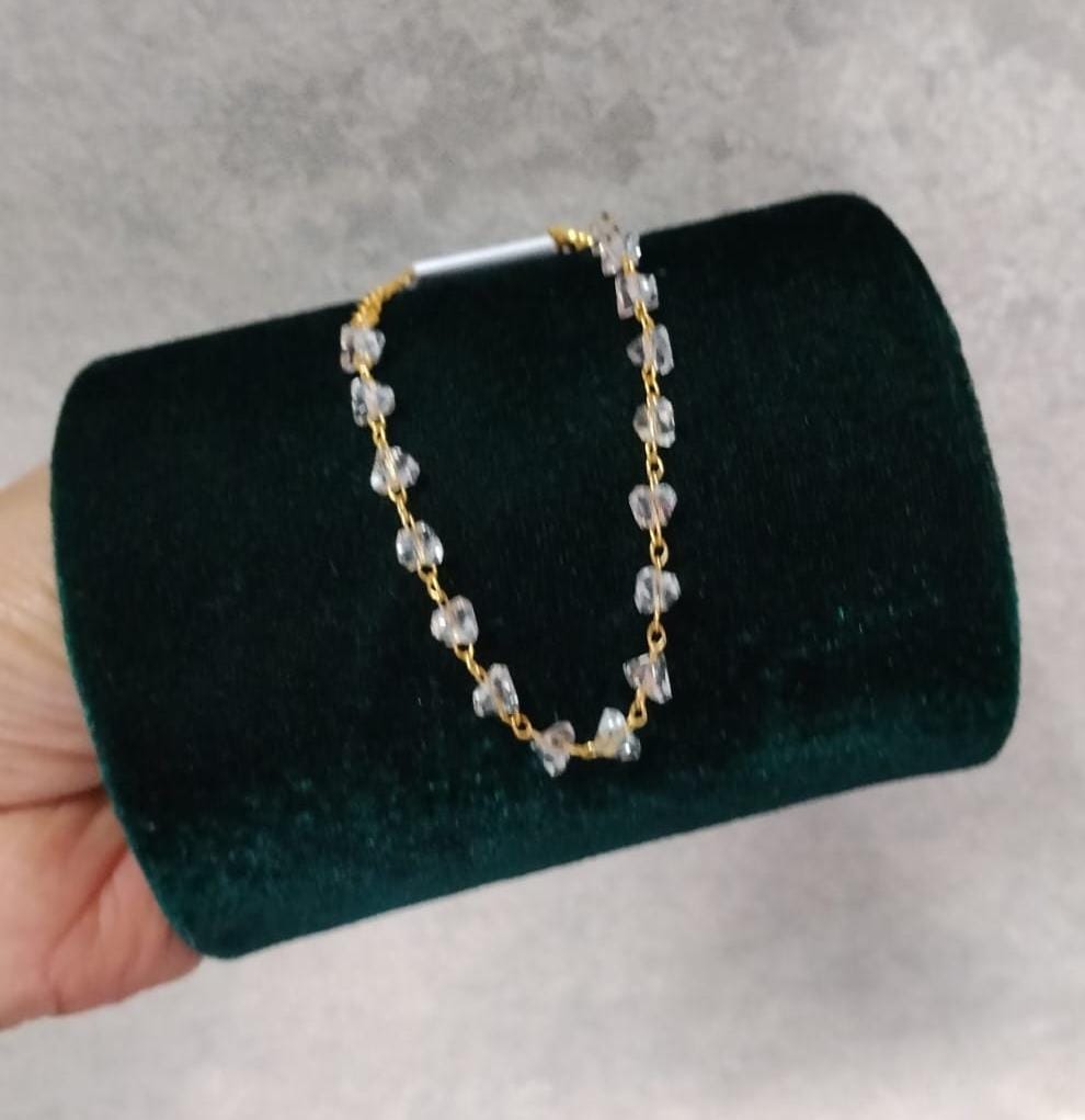 Foto de Pulseira dourada cristais