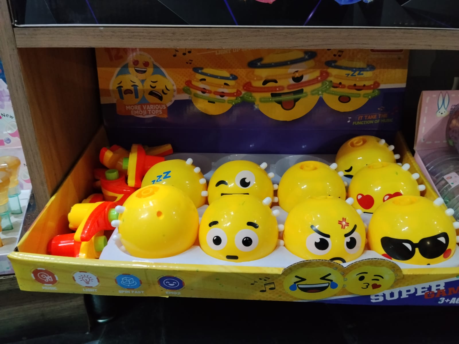 Foto de Brinquedo carinha feliz (Toca musica e acende a luz)