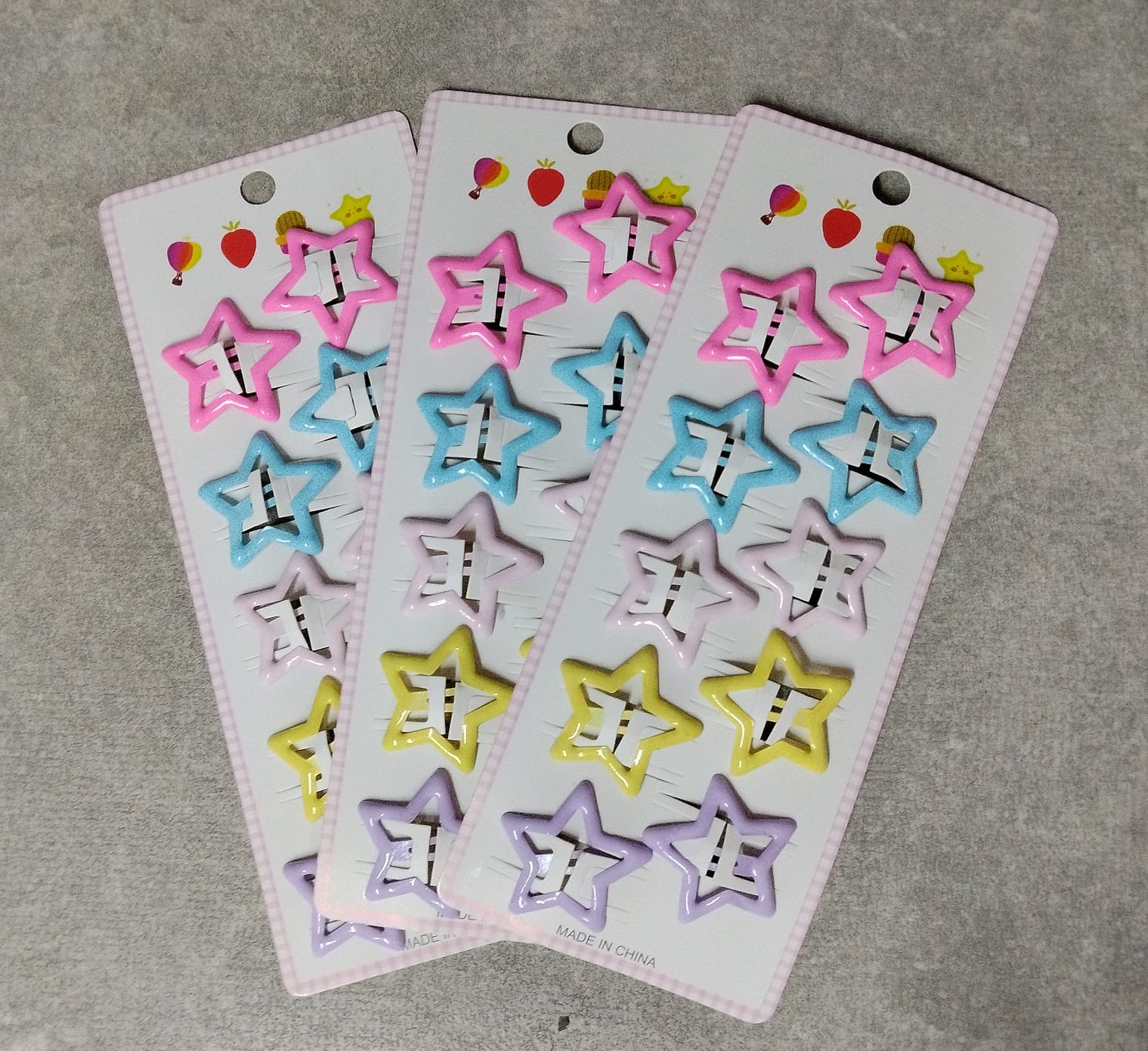 Foto de Cartela de estrelinhas colorida (roxo, amarelo, rosa cl, rosa escuro) tons pasteis