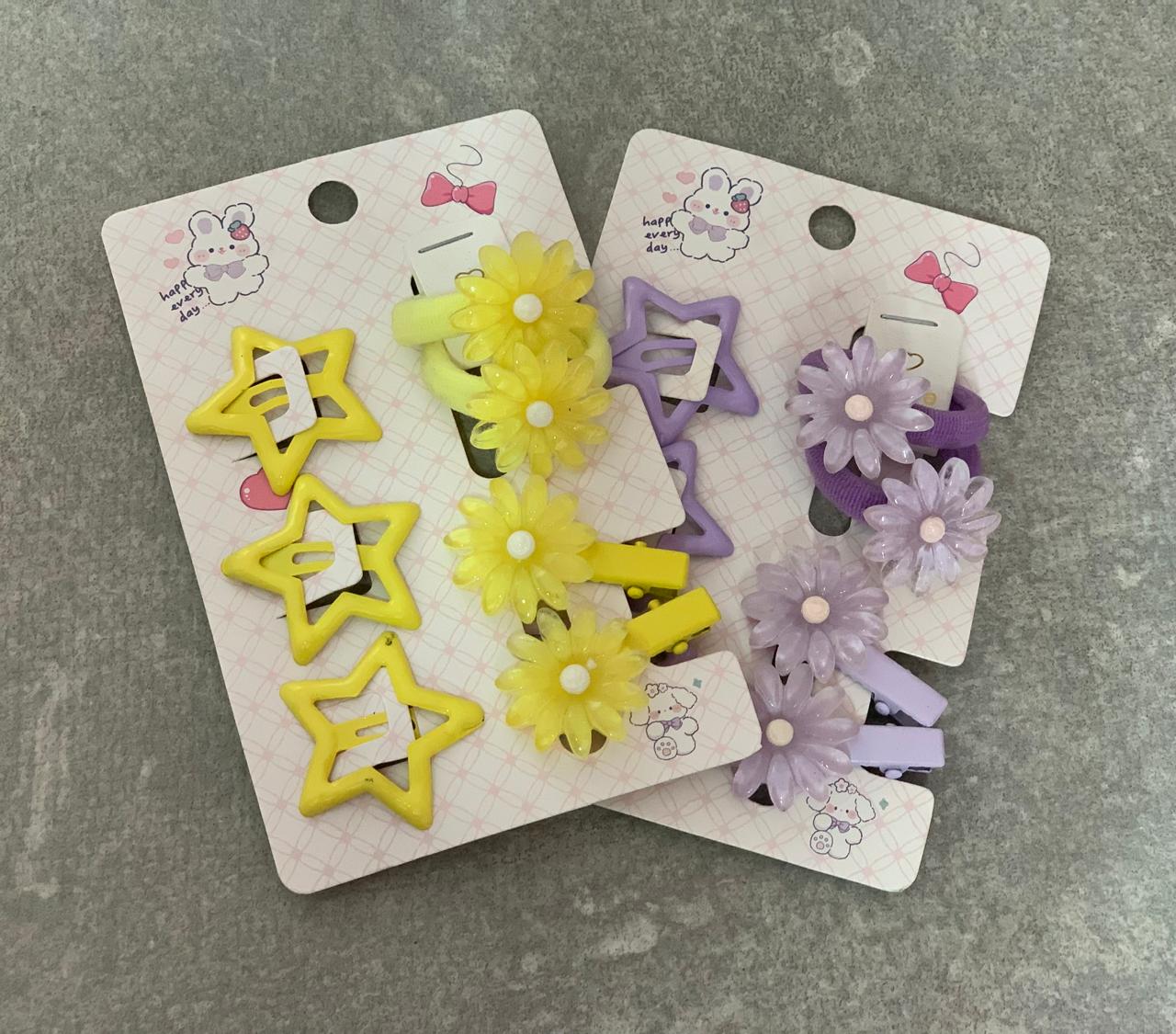 Foto de Cartela infantil com presilhas e elásticos, modelos de estrelas e flores