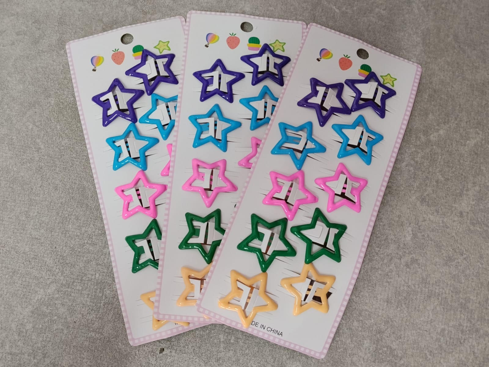 Foto de Cartela de estrelinhas coloridas (Laranja, verde, rosa,azul e roxo)