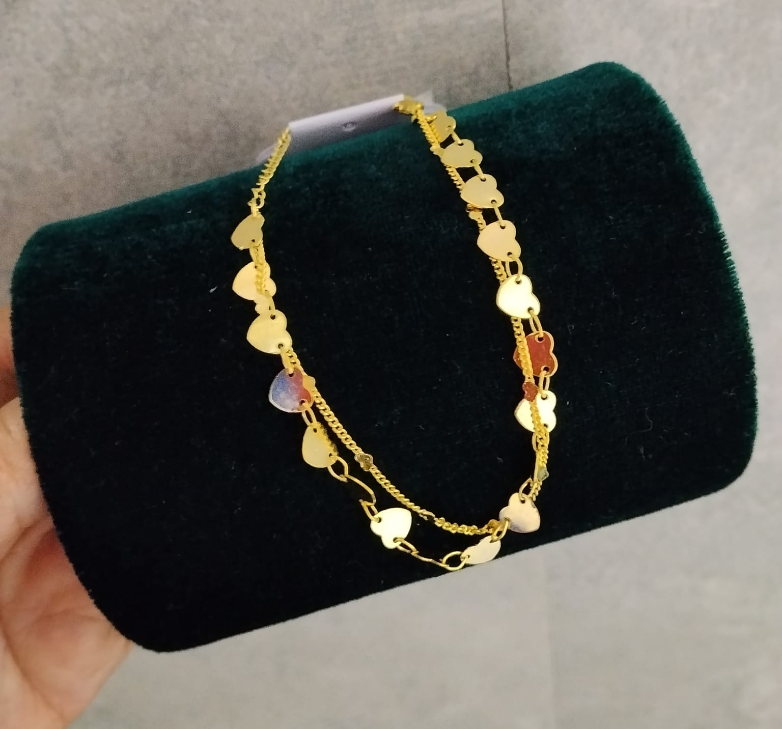 Foto de Pulseira dourada em elos de coração