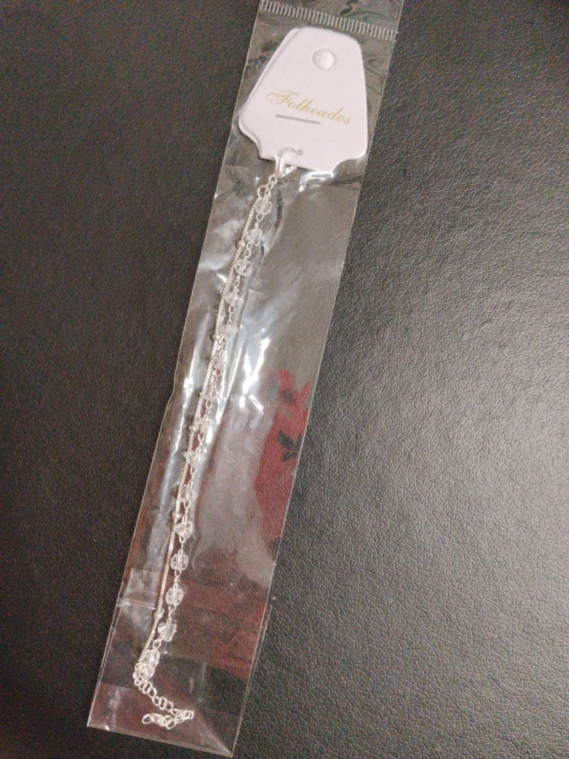 Foto de Pulseira folheada com corrente e pedras transparentes